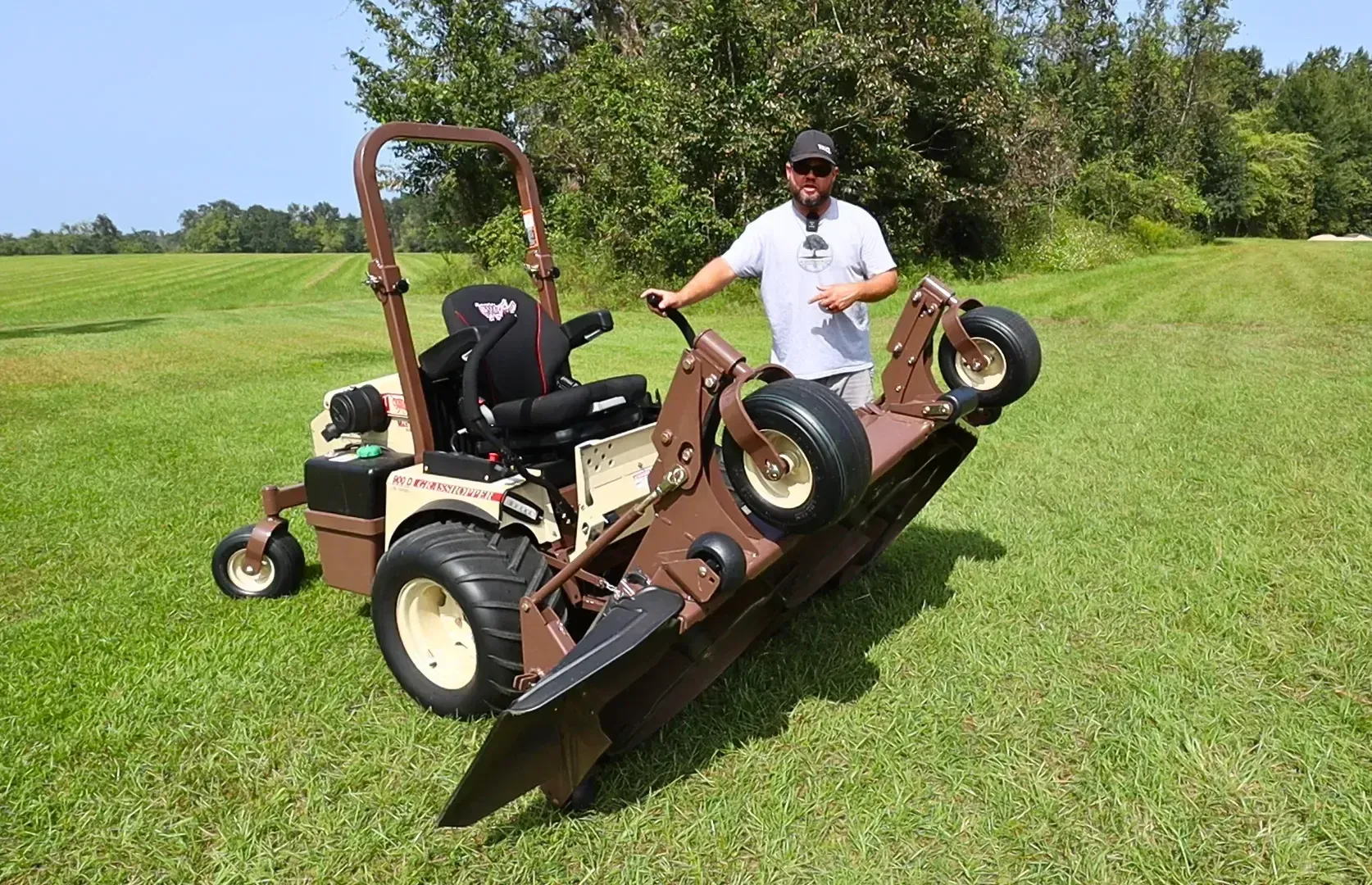 Grasshopper mower with the front deck folded up for easy service